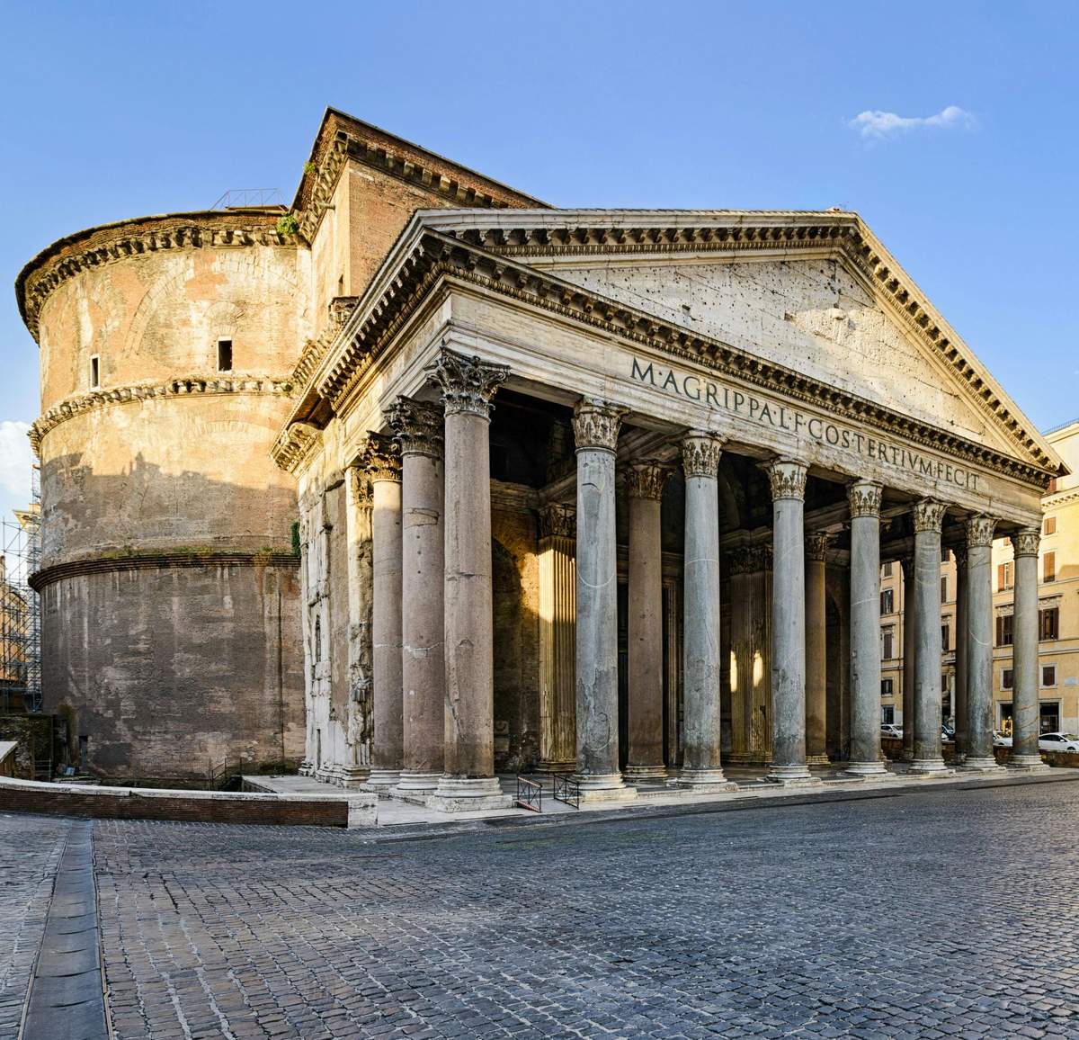 Rome Pantheon: Fast Track Ticket + Official Audio Guide Ancient Roman Pantheon with large columns, triangular pediment, and a rounded rotunda in an empty cobblestone plaza under a clear sky.