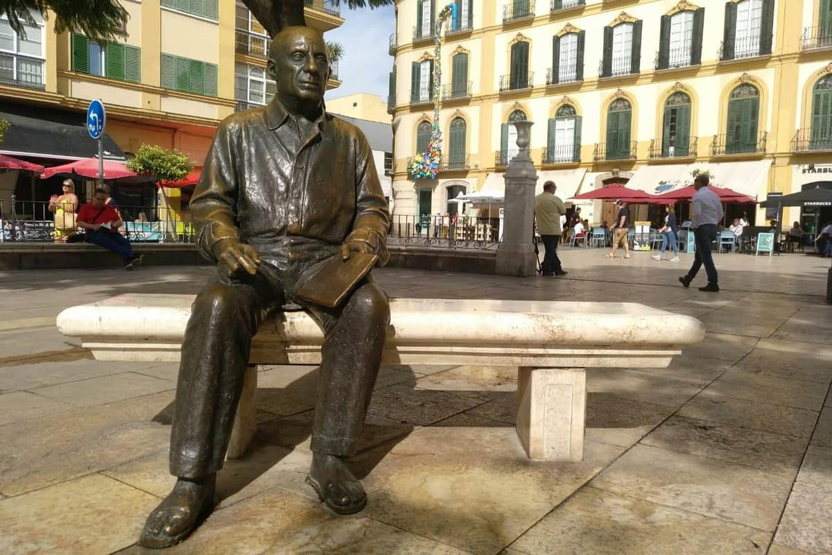 Picasso Birthplace Museum: Skip The Line Ticket + Guided Tour Statue of Picasso sitting on the bench, Plaza de la Merced